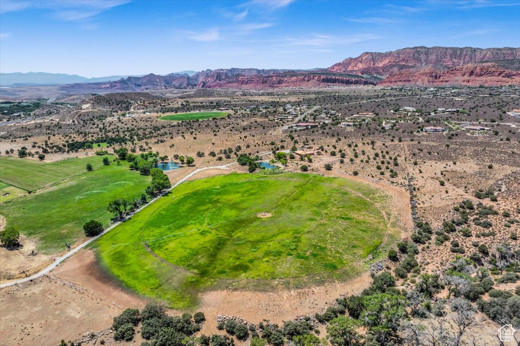 Birds eye view of property featuring a mountain view