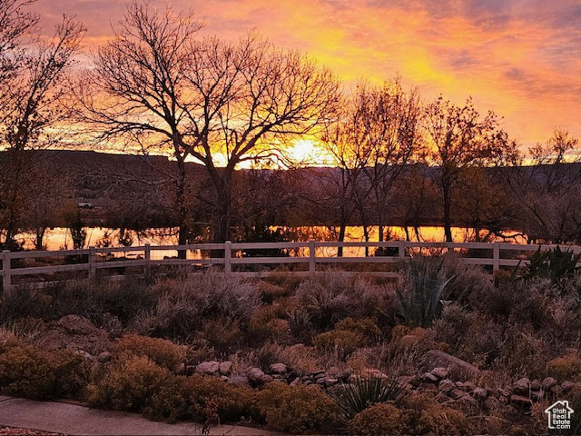 Yard at dusk with a water view
