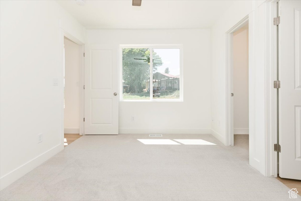 Spare room with light carpet