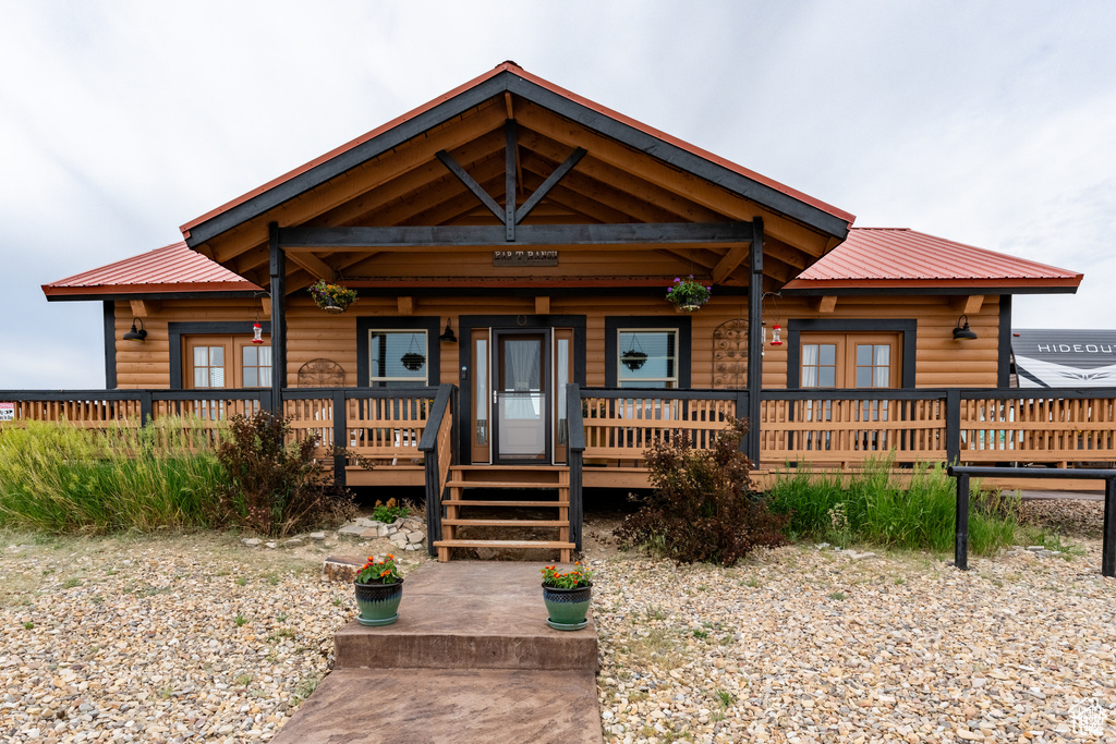 Log home with covered porch