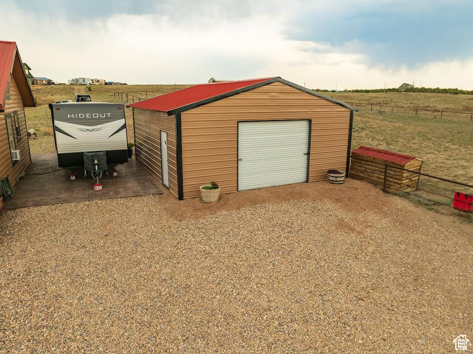 Garage featuring a rural view