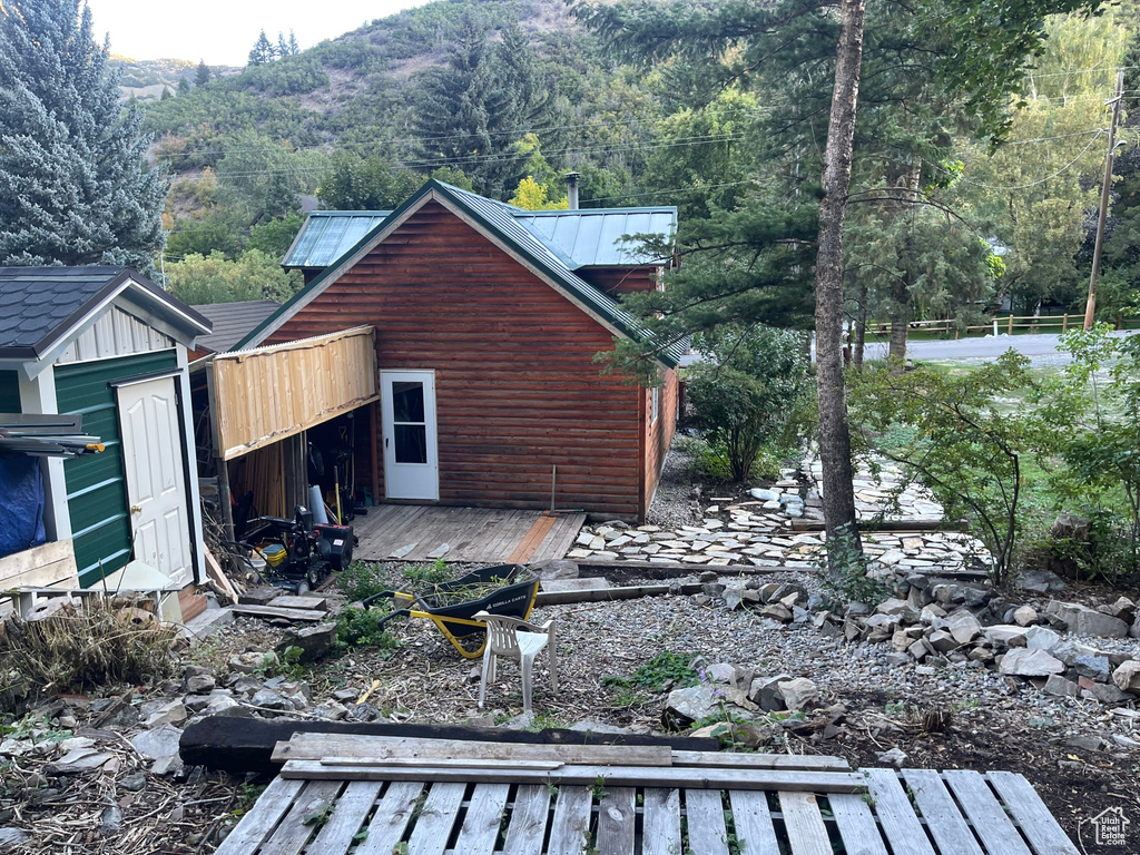 Exterior space with a wooden deck