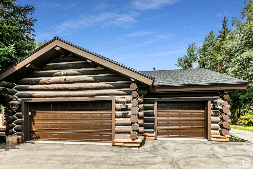 View of front of property with a garage