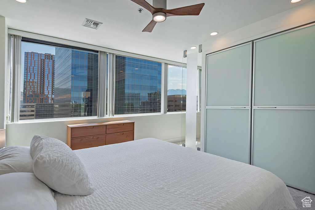 Bedroom with a closet and ceiling fan