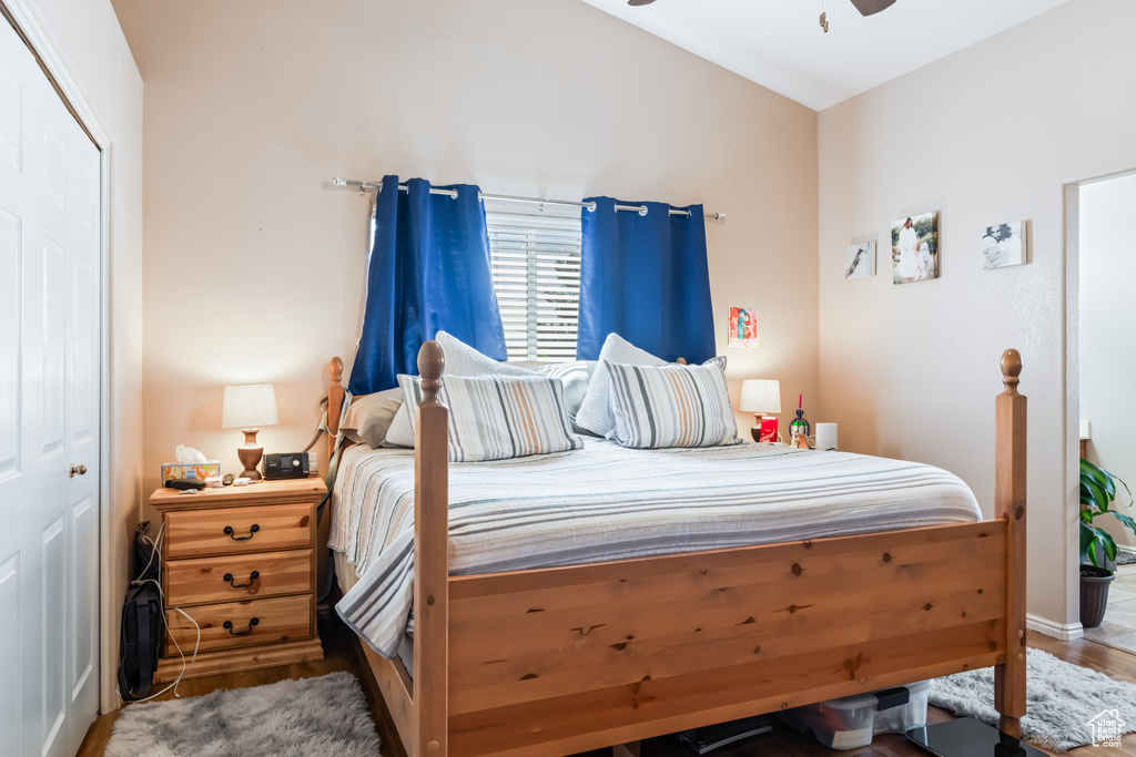 Bedroom featuring hardwood / wood-style floors and a closet