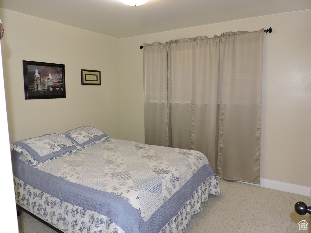 Bedroom featuring carpet