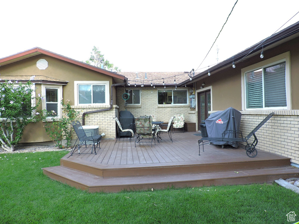 Wooden deck with a lawn