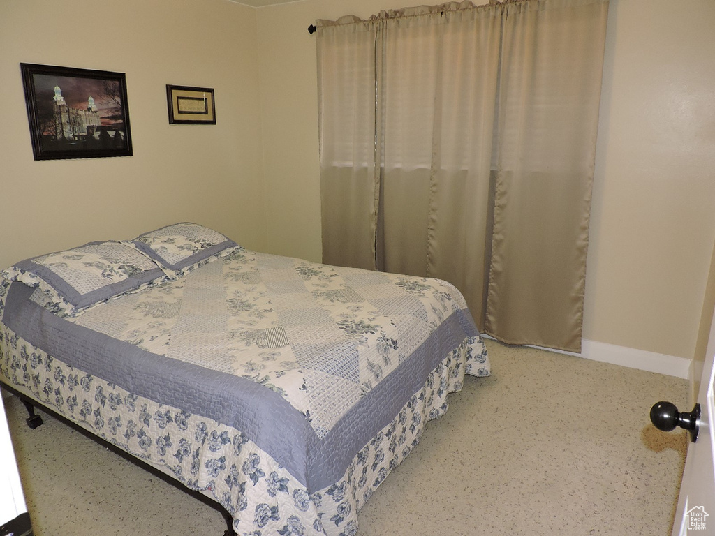 Bedroom with carpet