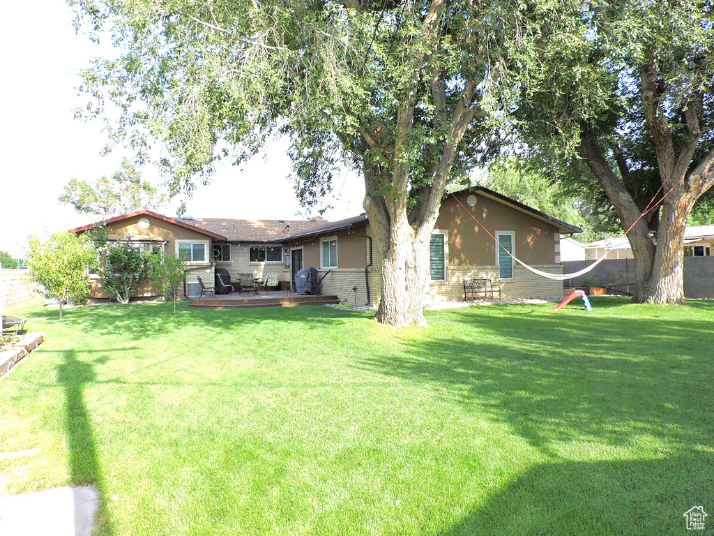 View of yard featuring a deck