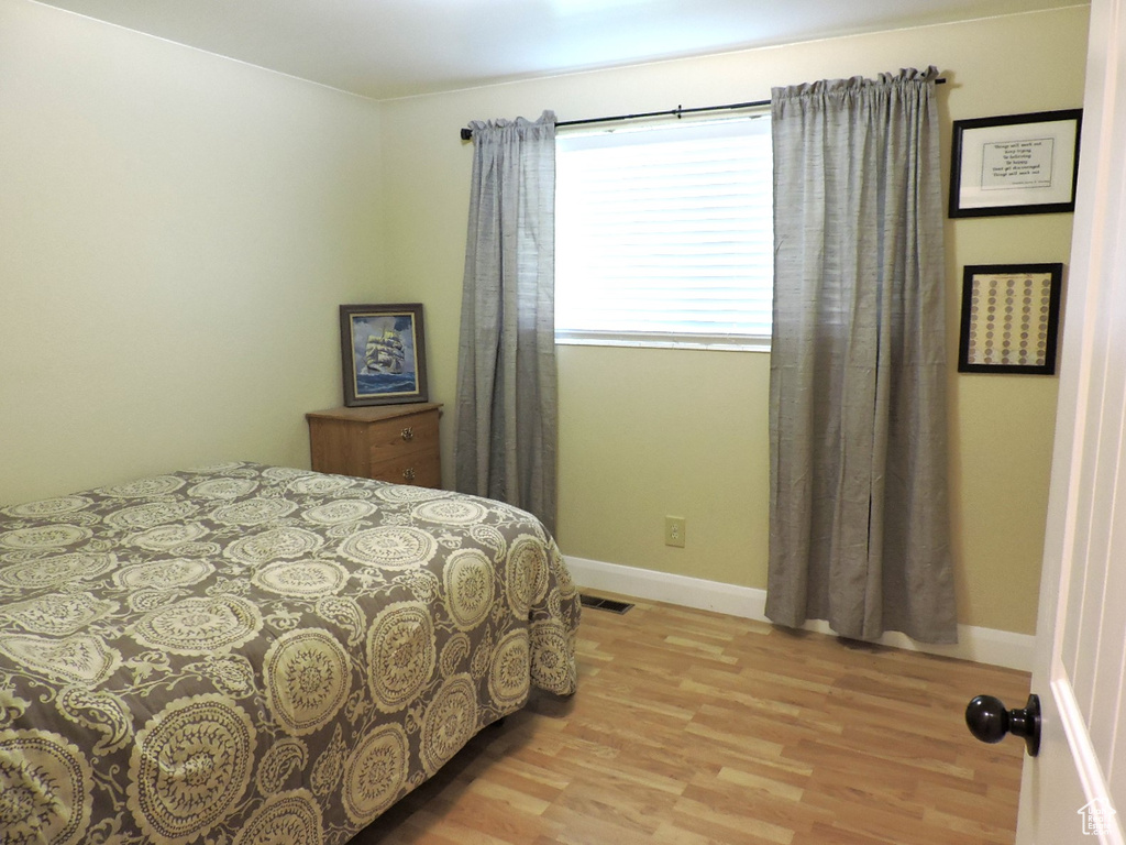 Bedroom featuring light hardwood / wood-style flooring