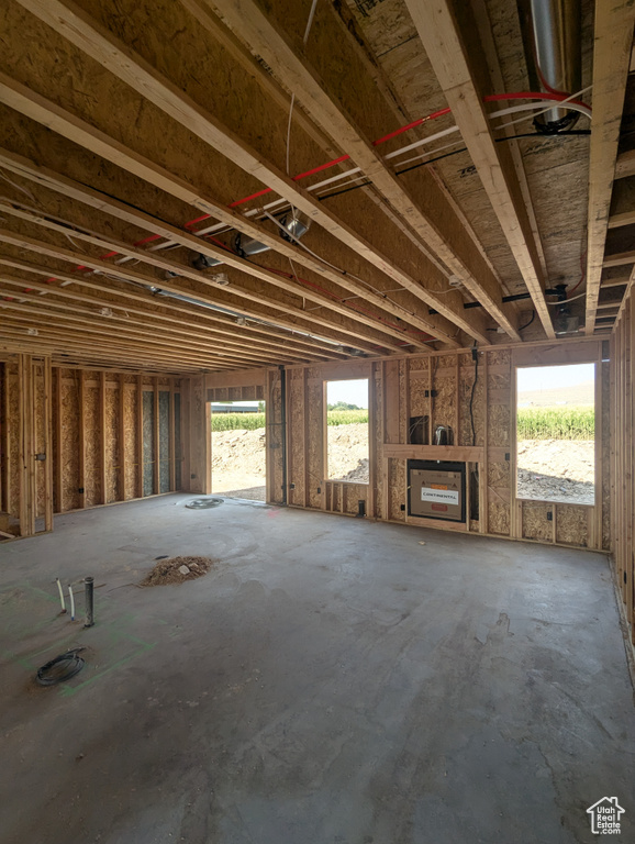 Misc room featuring a fireplace and a wealth of natural light