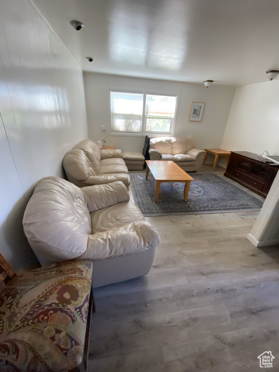 Living room with hardwood / wood-style floors