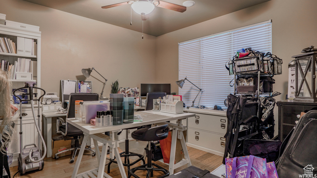 Office featuring ceiling fan and light hardwood / wood-style flooring