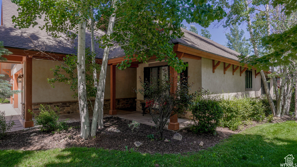 View of front of property with a patio