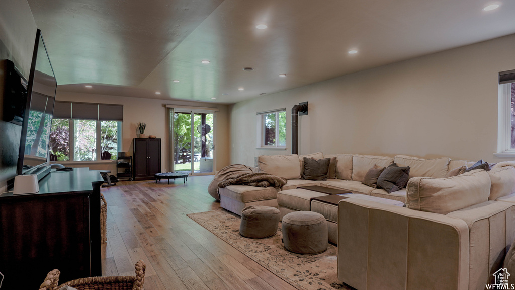 Living room featuring light hardwood / wood-style flooring and a wealth of natural light