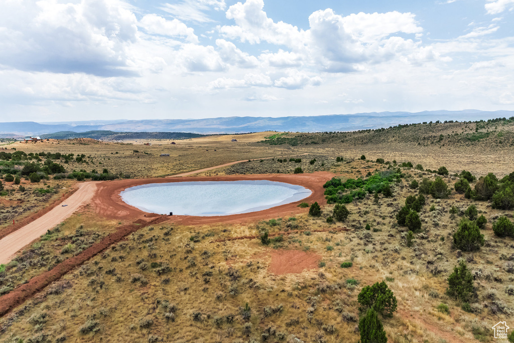 Bird's eye view featuring a water and mountain view