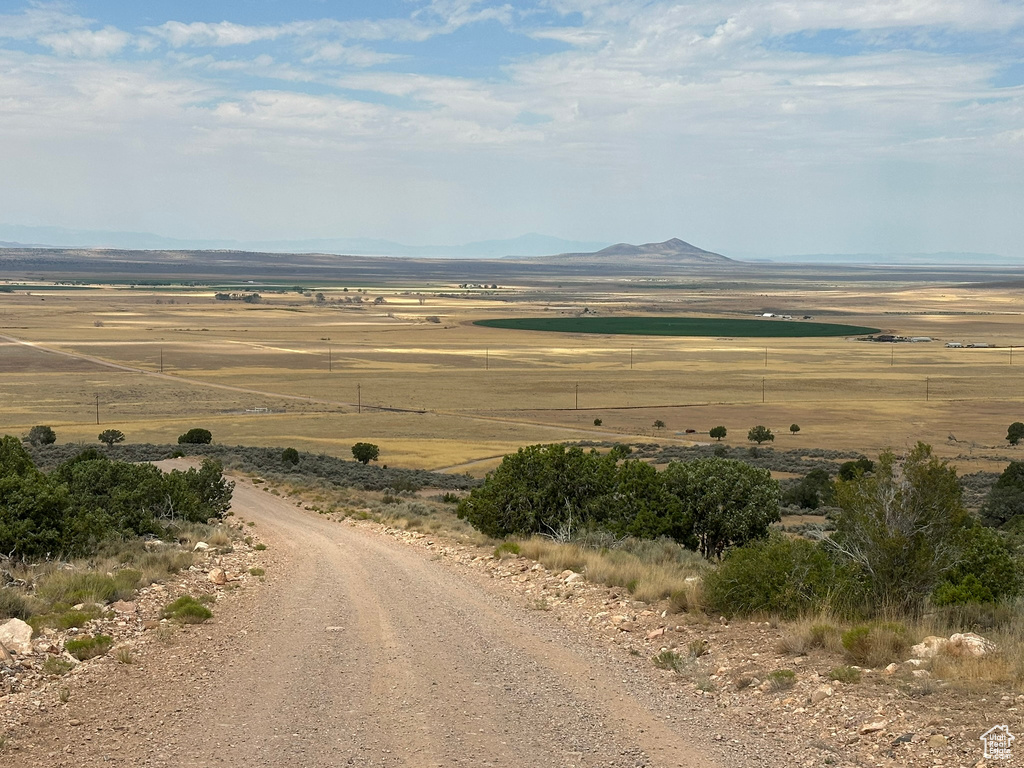 Property view of mountains featuring a rural view