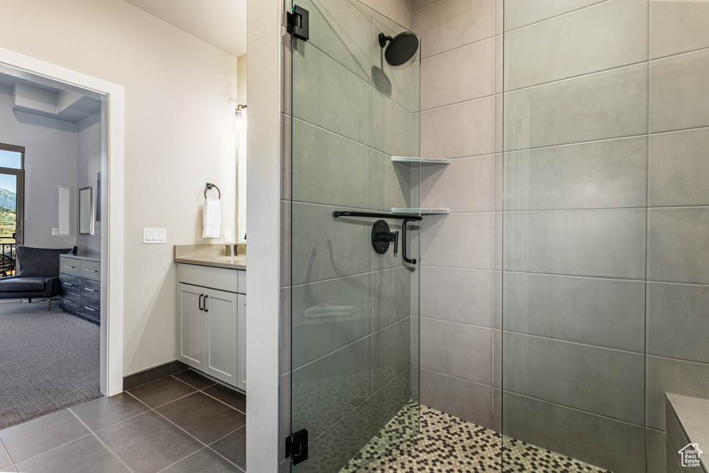 Bathroom with vanity and walk in shower