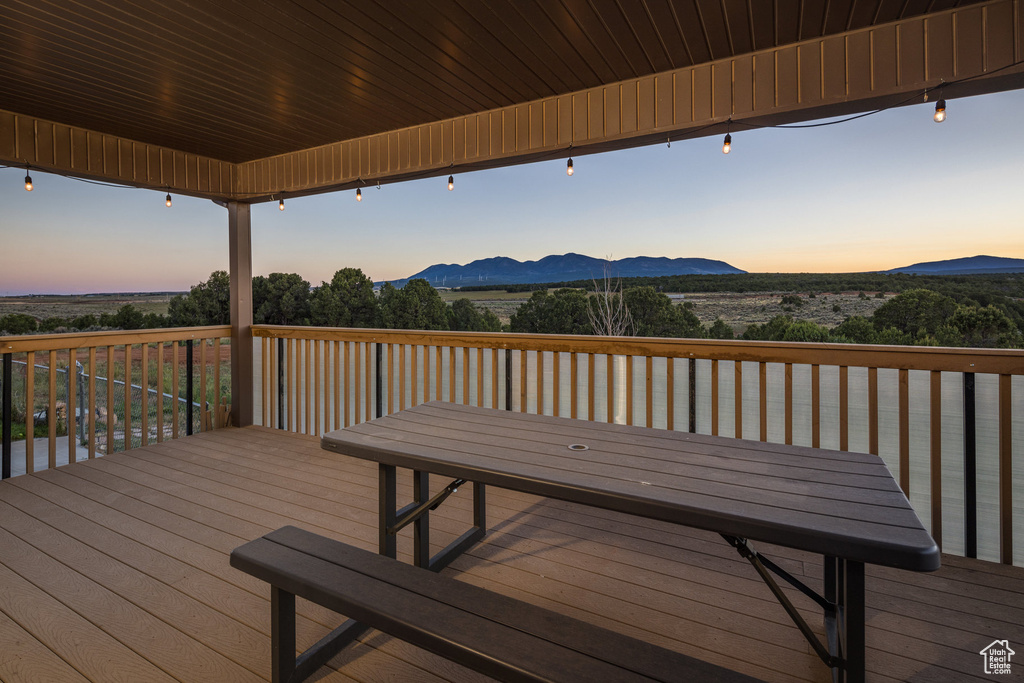 Deck at dusk with a mountain view