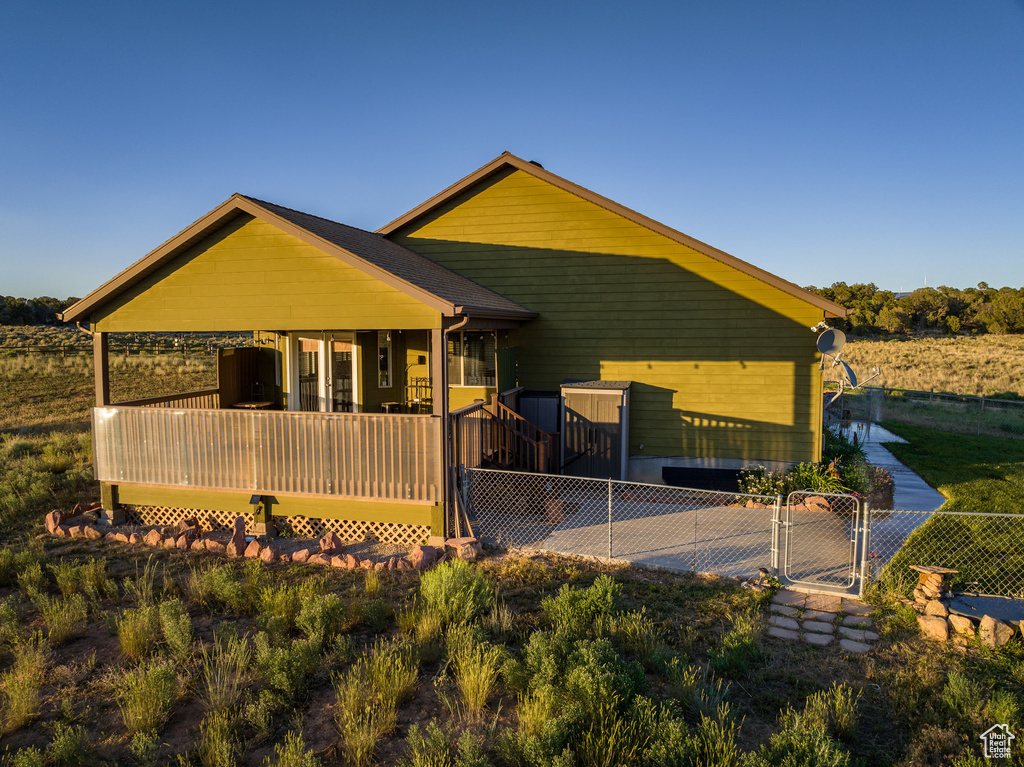 View of front of house with a deck