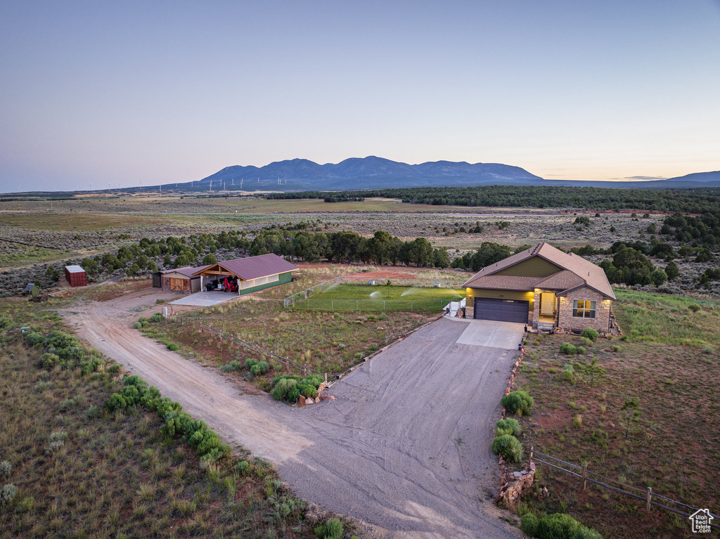 Property view of mountains with a rural view