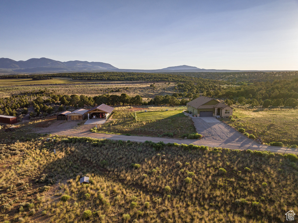 Property view of mountains with a rural view