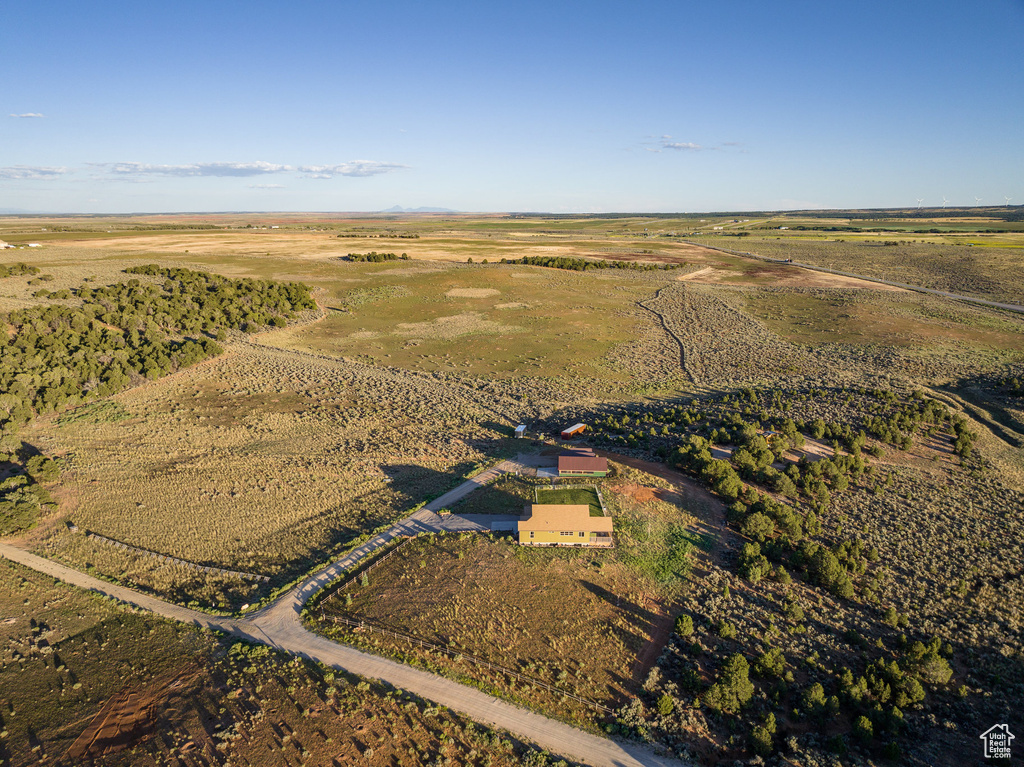 Birds eye view of property featuring a rural view