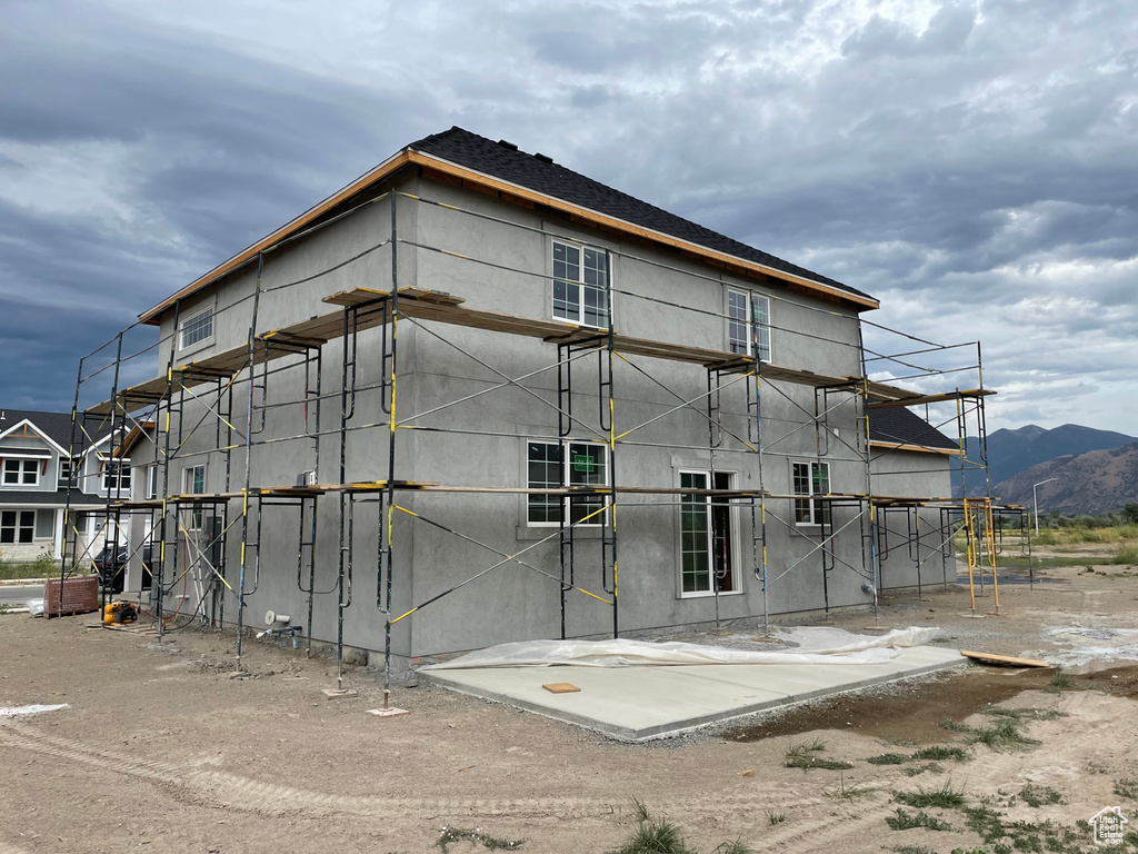 Exterior space featuring a mountain view