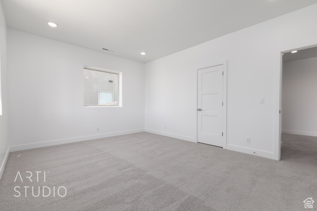 View of carpeted spare room