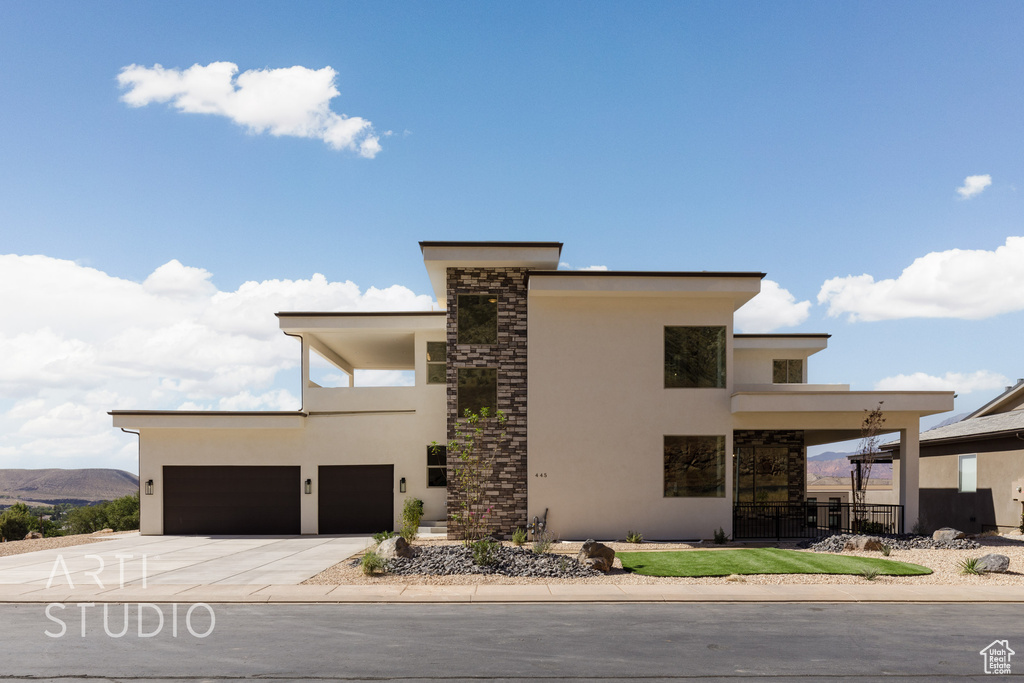 Modern home featuring a mountain view