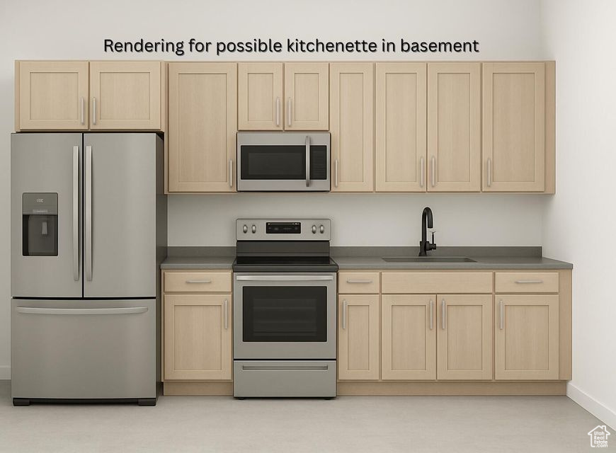 Kitchen with stainless steel appliances and light brown cabinetry