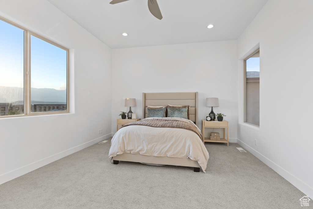 Bedroom featuring carpet, a ceiling fan, and recessed lighting