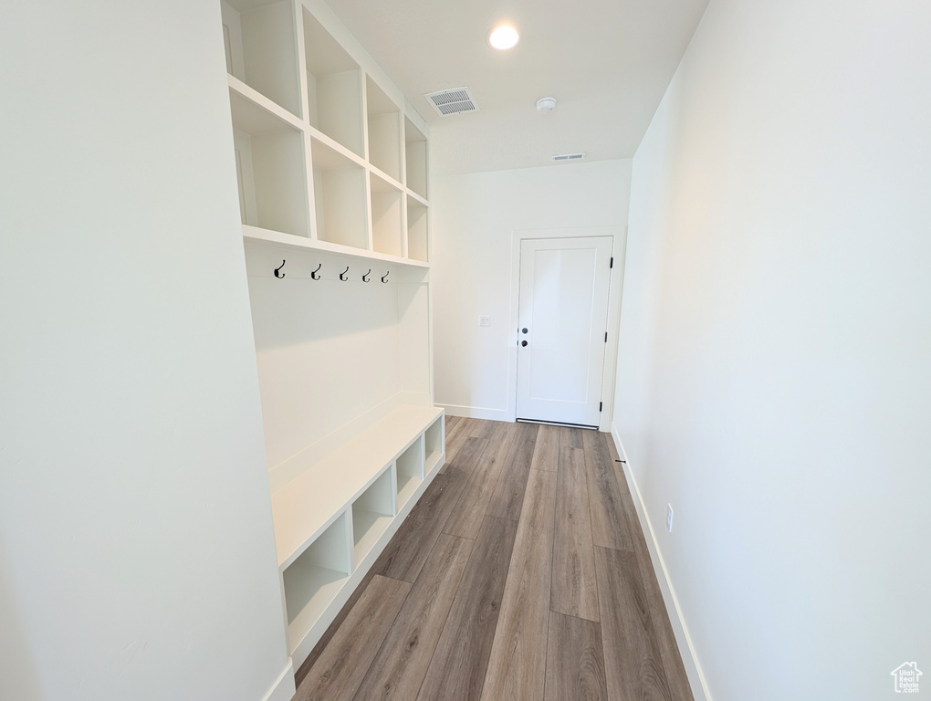 Mudroom featuring hardwood / wood-style flooring