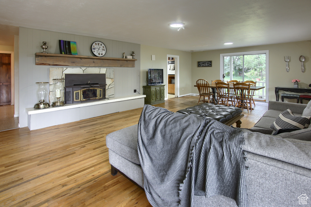 Living room with light wood-type flooring