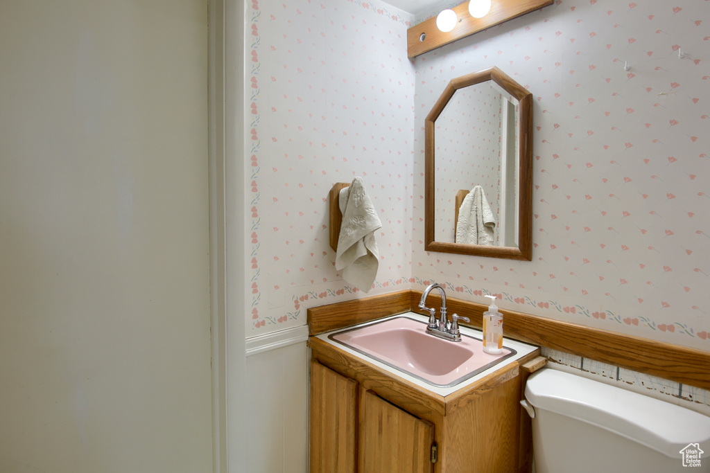 Bathroom with vanity and toilet