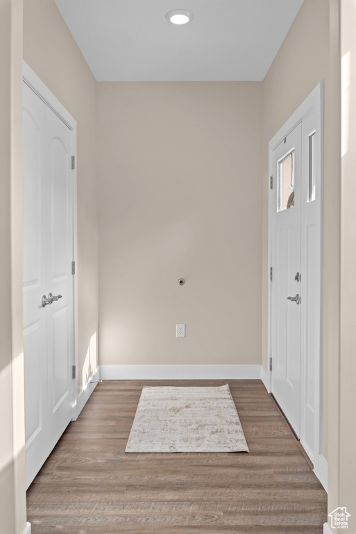 Foyer with hardwood / wood-style flooring