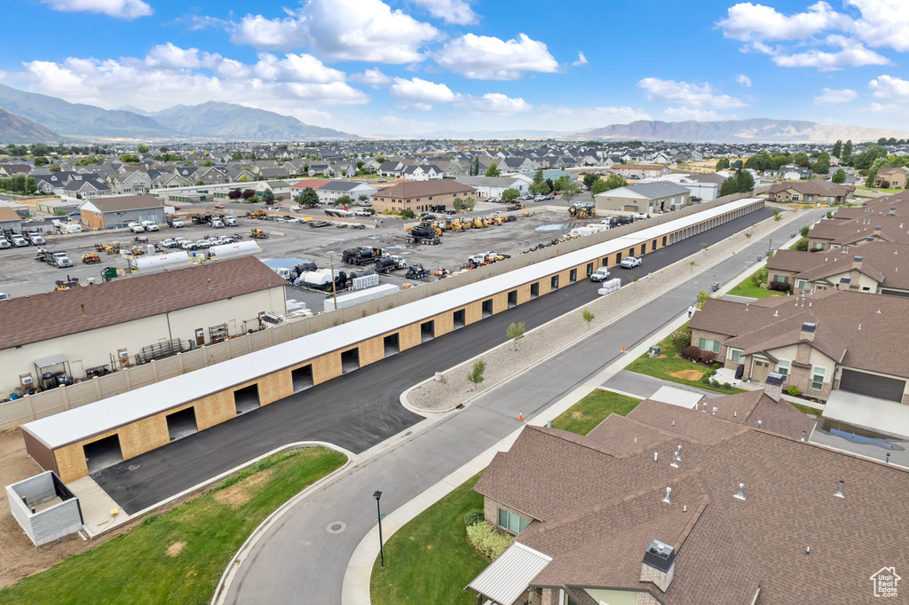 Birds eye view of property with a mountain view