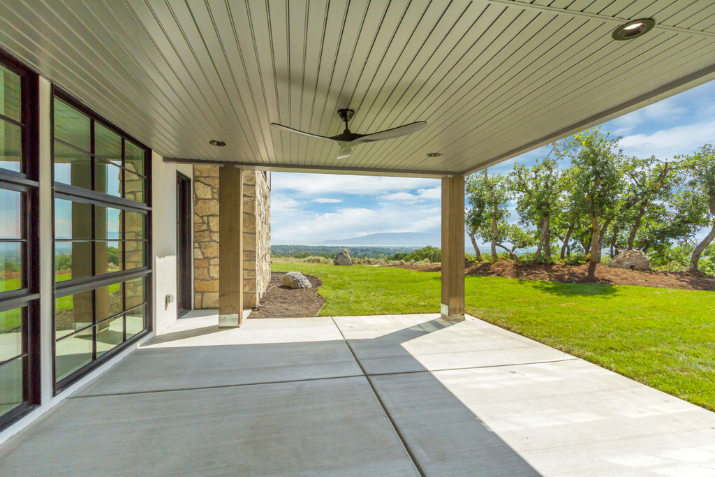 View of patio / terrace featuring ceiling fan