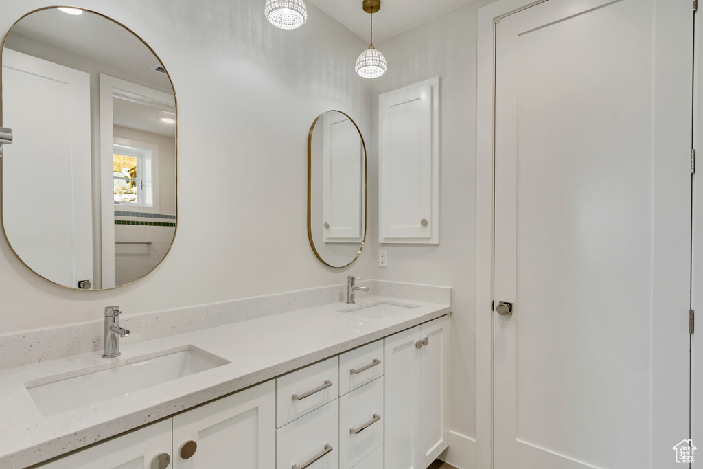 Bathroom featuring dual vanity