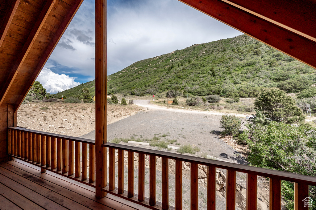 Wooden deck featuring a mountain view