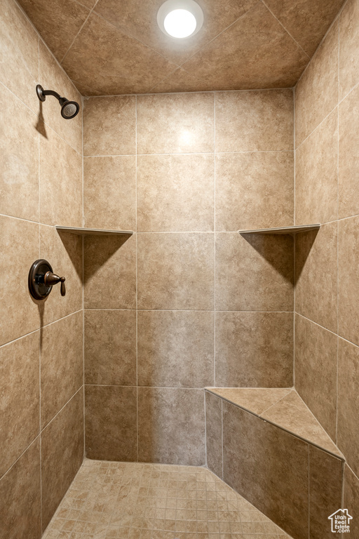 Bathroom with a tile shower