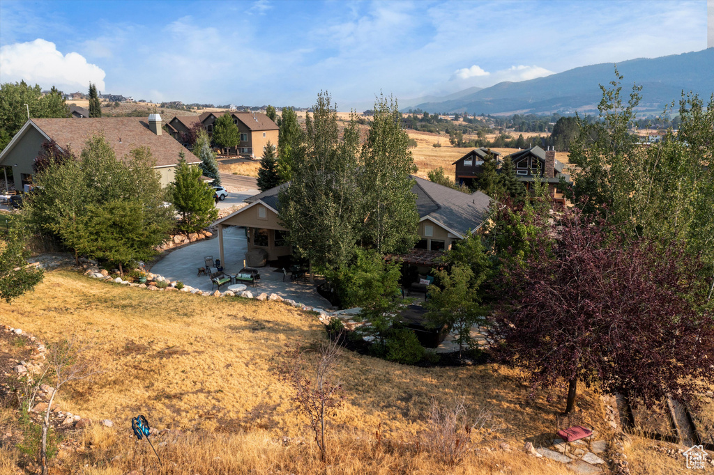 Exterior space featuring a mountain view