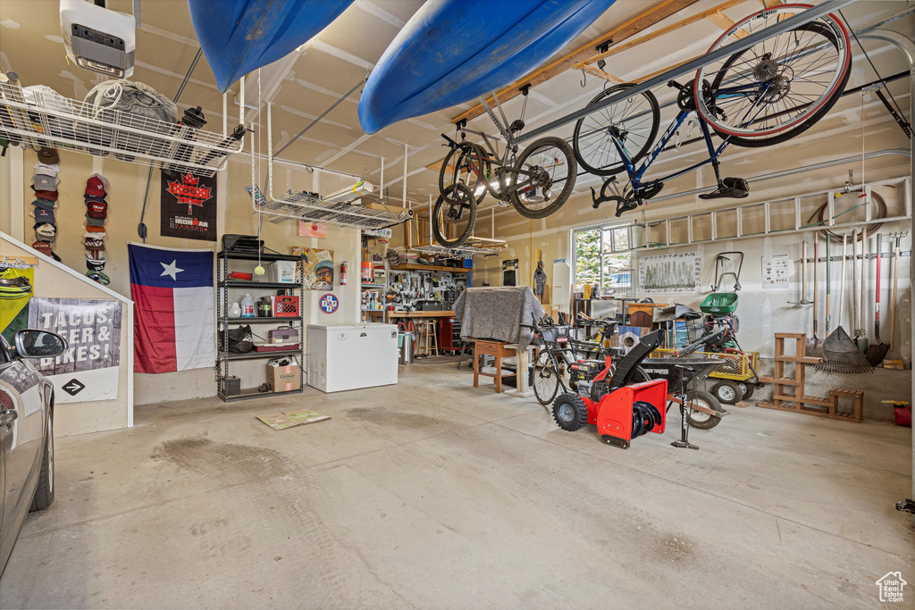 Garage featuring a workshop area