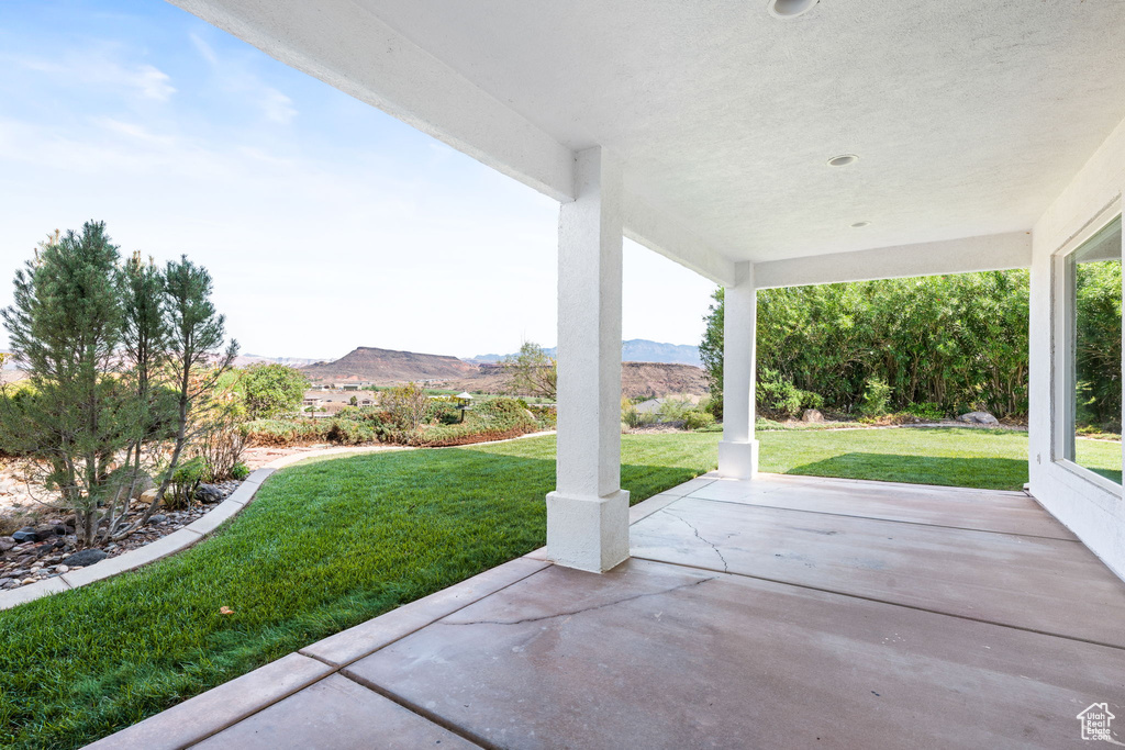 View of patio with a mountain view