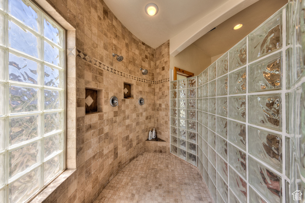 Bathroom with a tile shower