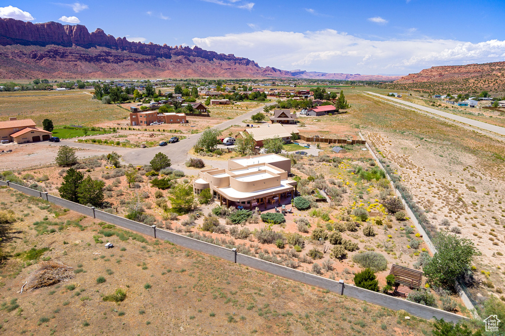 Birds eye view of property featuring a mountain view