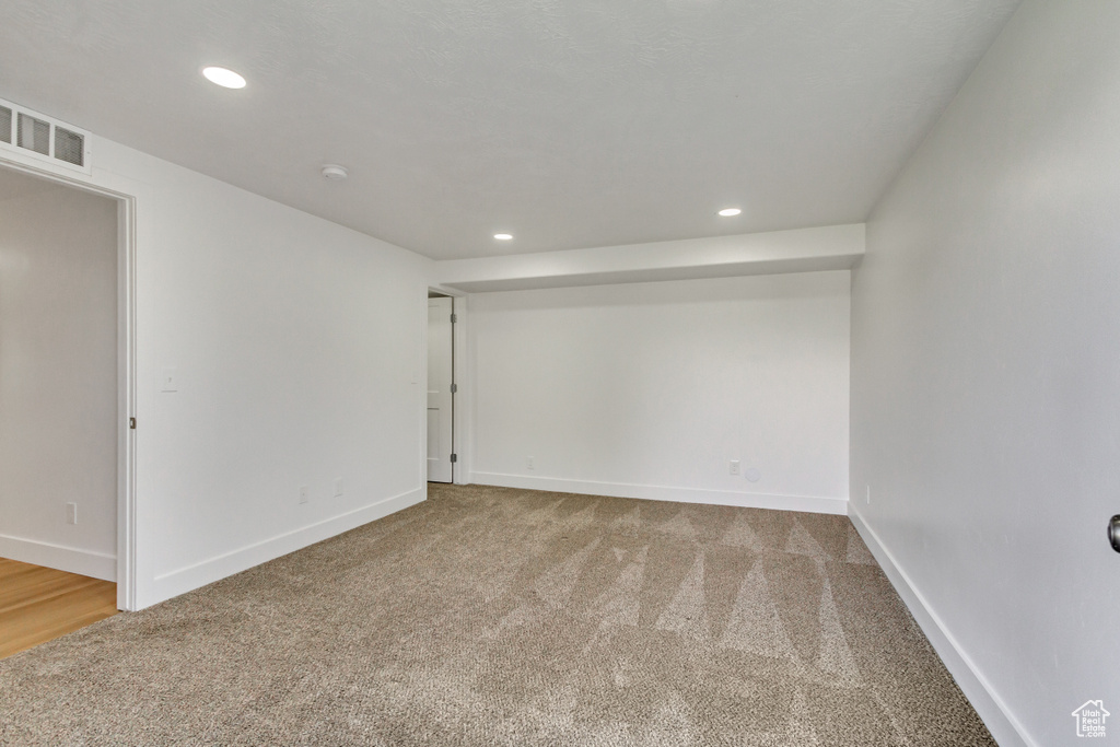 Unfurnished room featuring carpet floors