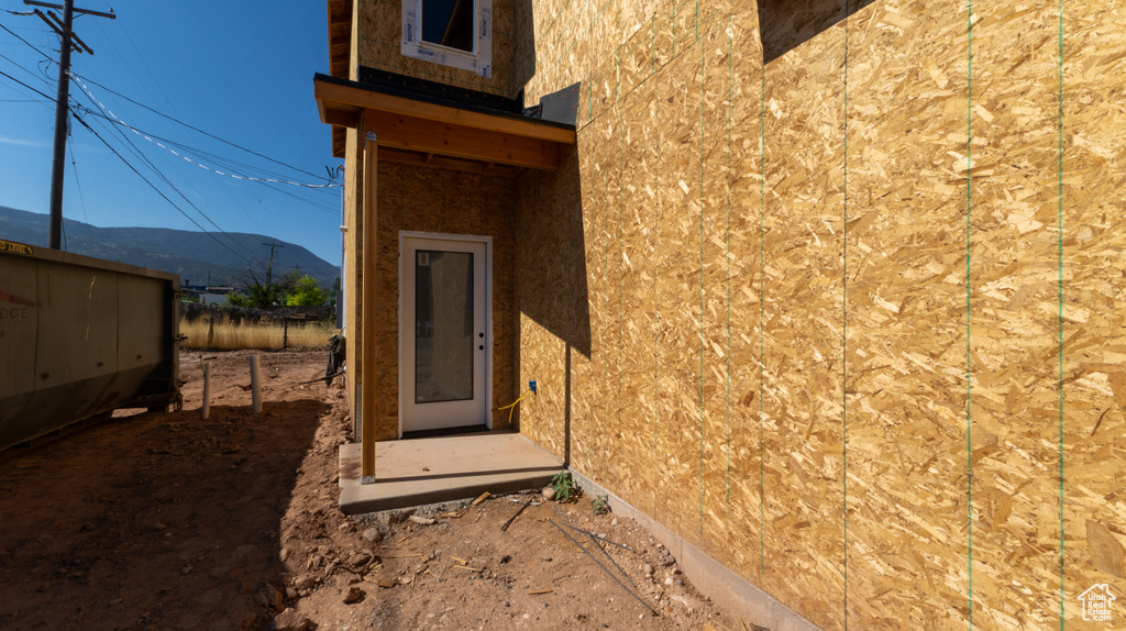 Doorway to property featuring a mountain view