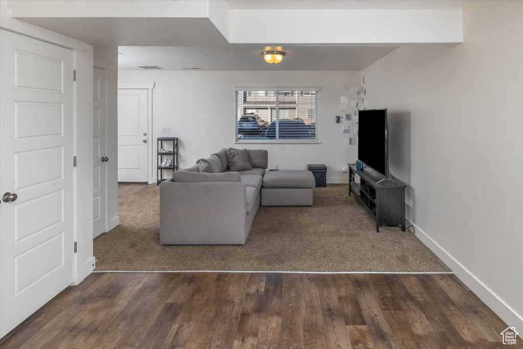 Living room featuring wood-type flooring