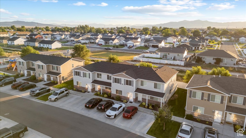 Birds eye view of property with a mountain view